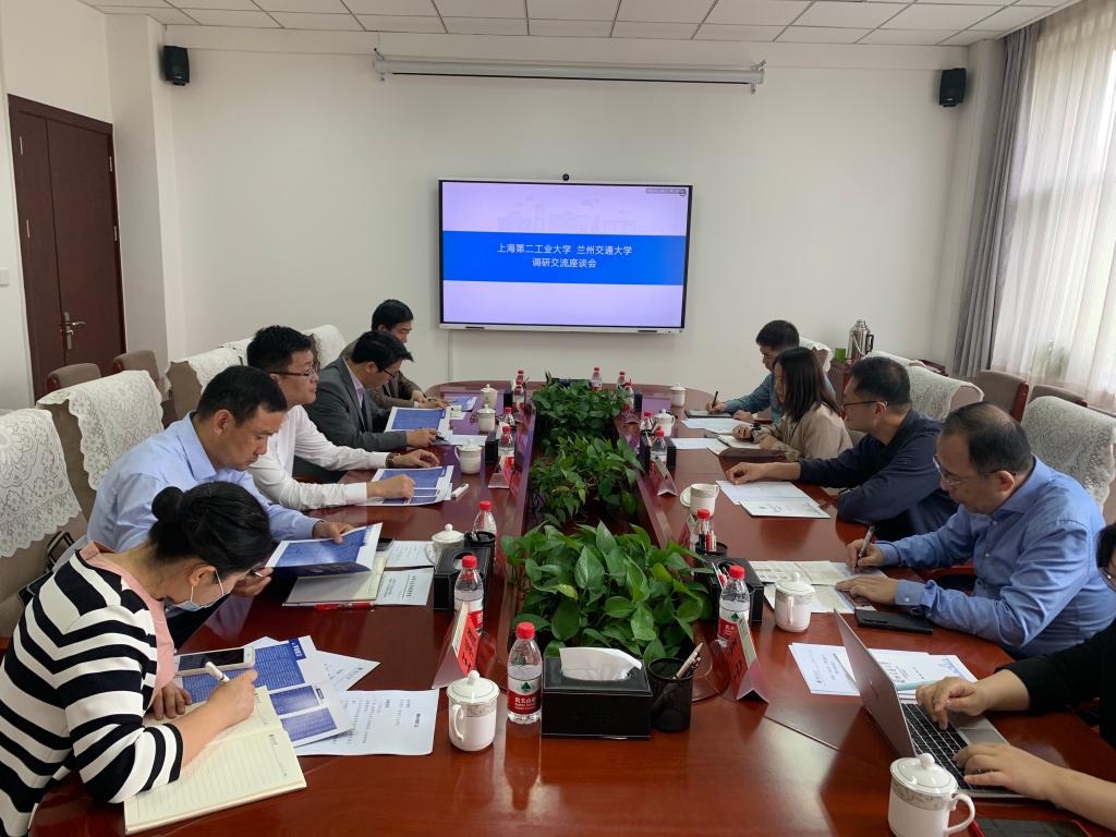 上海第二工业大学党委常委、副校长丁力一行来我校交流座谈